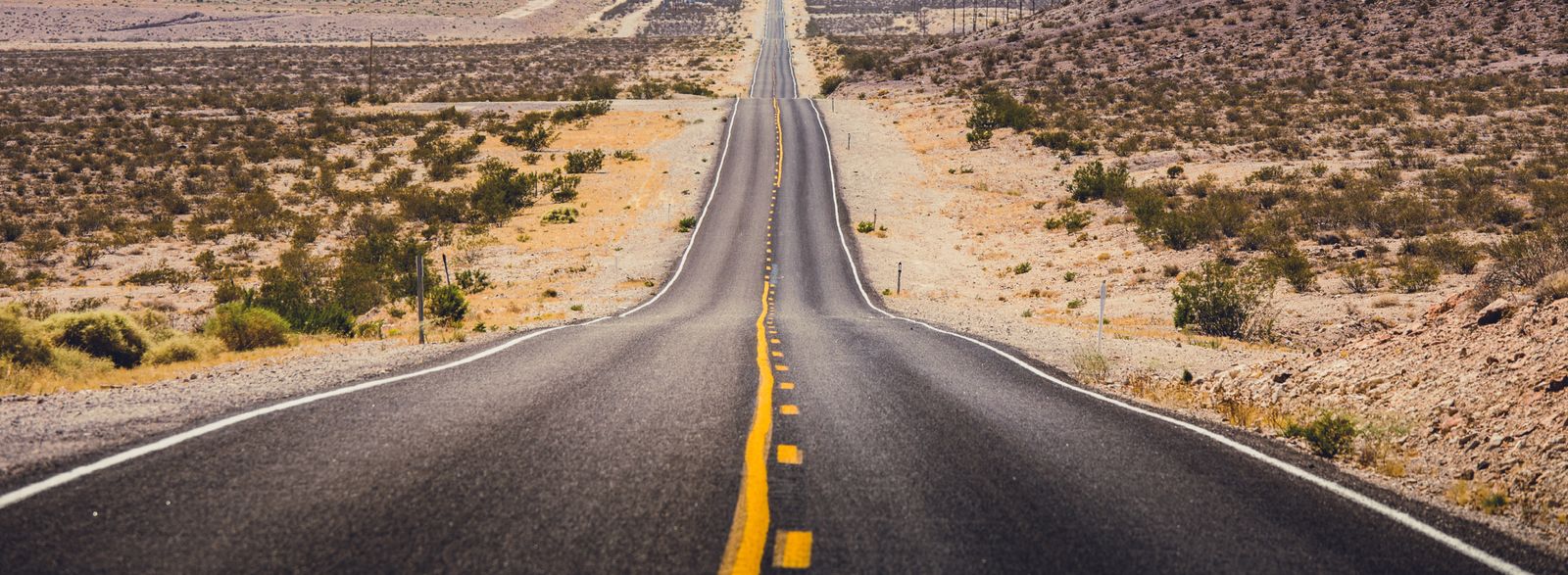 Road through desert landscape